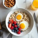 Low-sodium breakfast spread with plain oatmeal, eggs, avocado toast, and fresh fruit