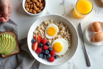 Low-sodium breakfast spread with plain oatmeal, eggs, avocado toast, and fresh fruit